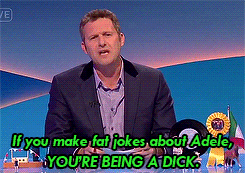 An animated Gif of comedian Adam Hills pointing angrily at the camera with the subtitle: "If you make fat jokes about Adele, YOU'RE BEING A DICK.  I'm referring to you Joan Rivers."